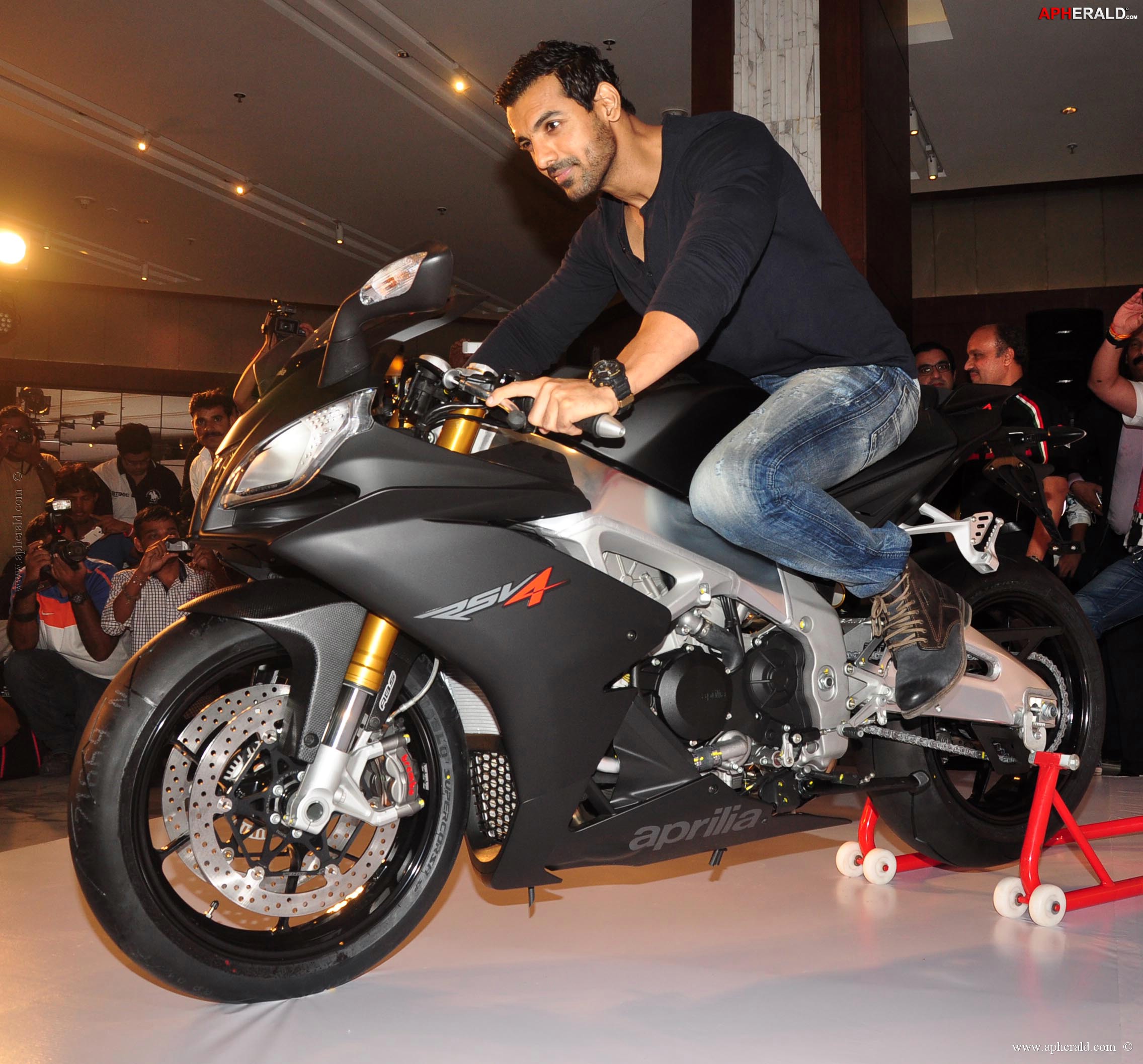 John Abraham owns an Black Aprilia RSV4