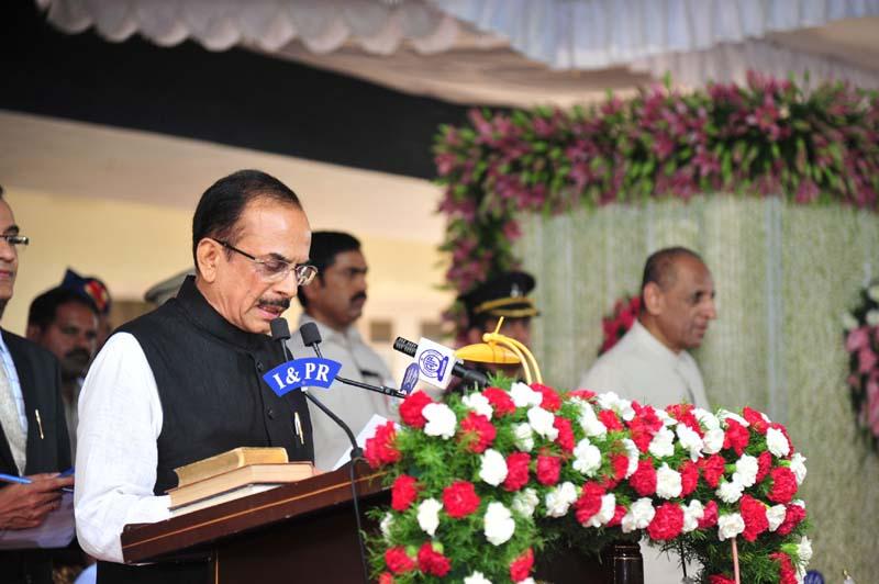 KCR sworn in as First CM