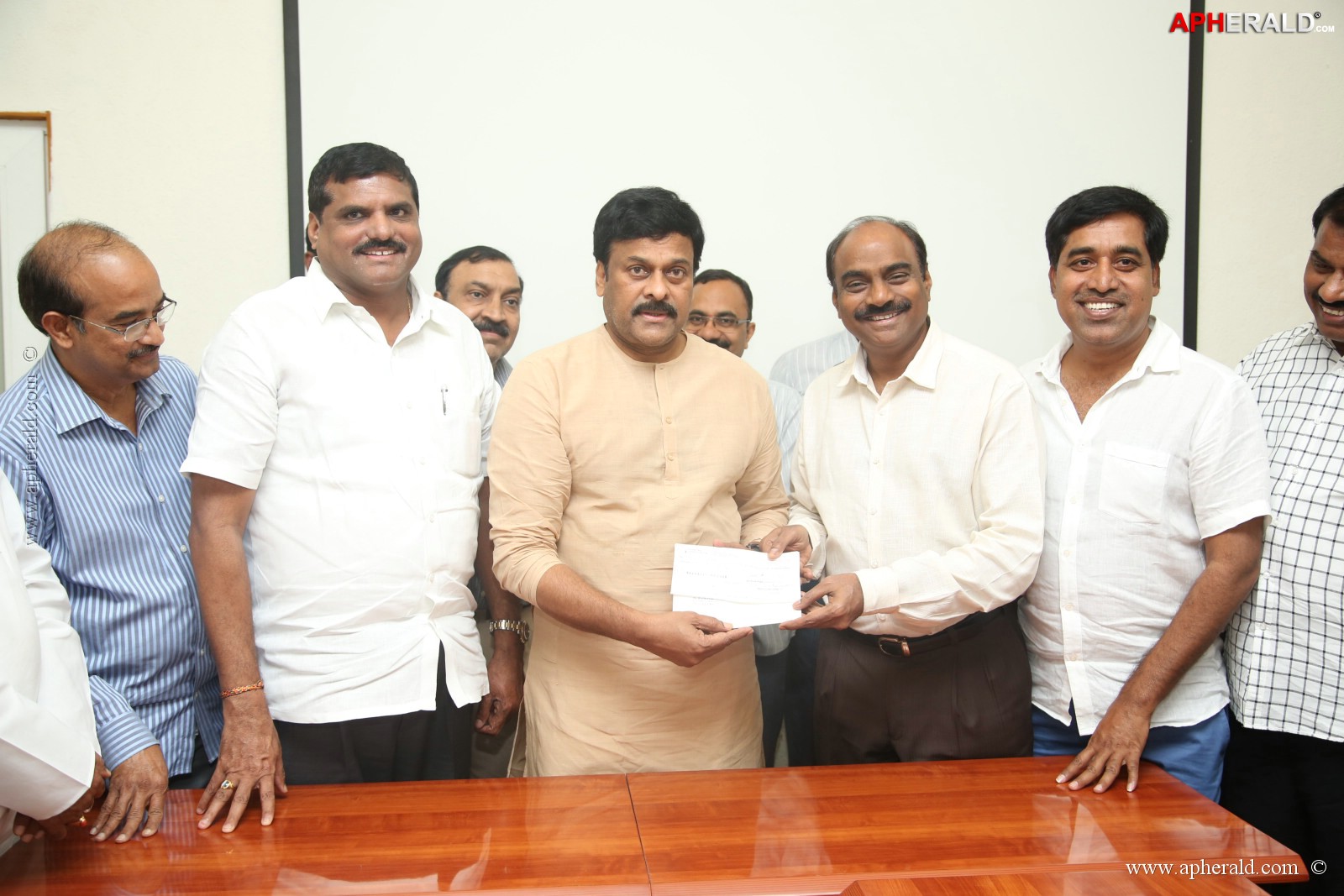 KL Narayana gives 10 Lakh Cheque To Chiranjeevi