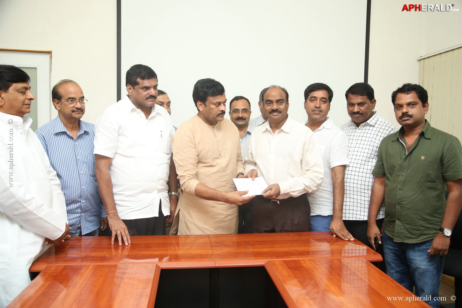 KL Narayana gives 10 Lakh Cheque To Chiranjeevi