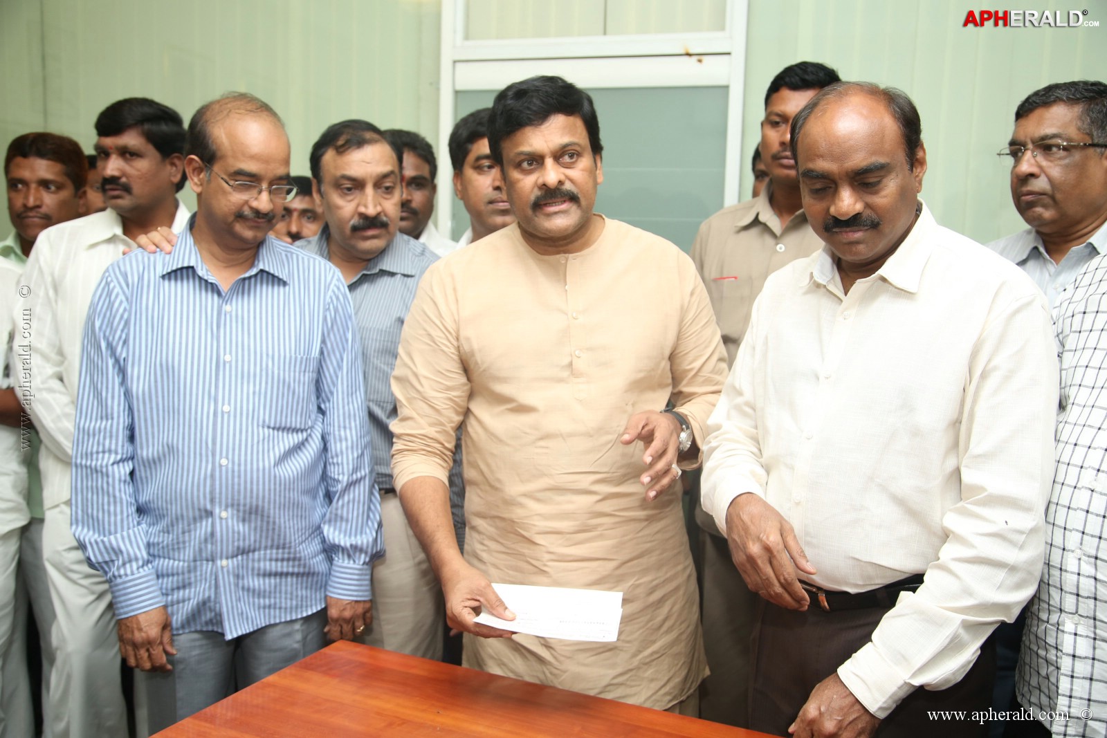 KL Narayana gives 10 Lakh Cheque To Chiranjeevi