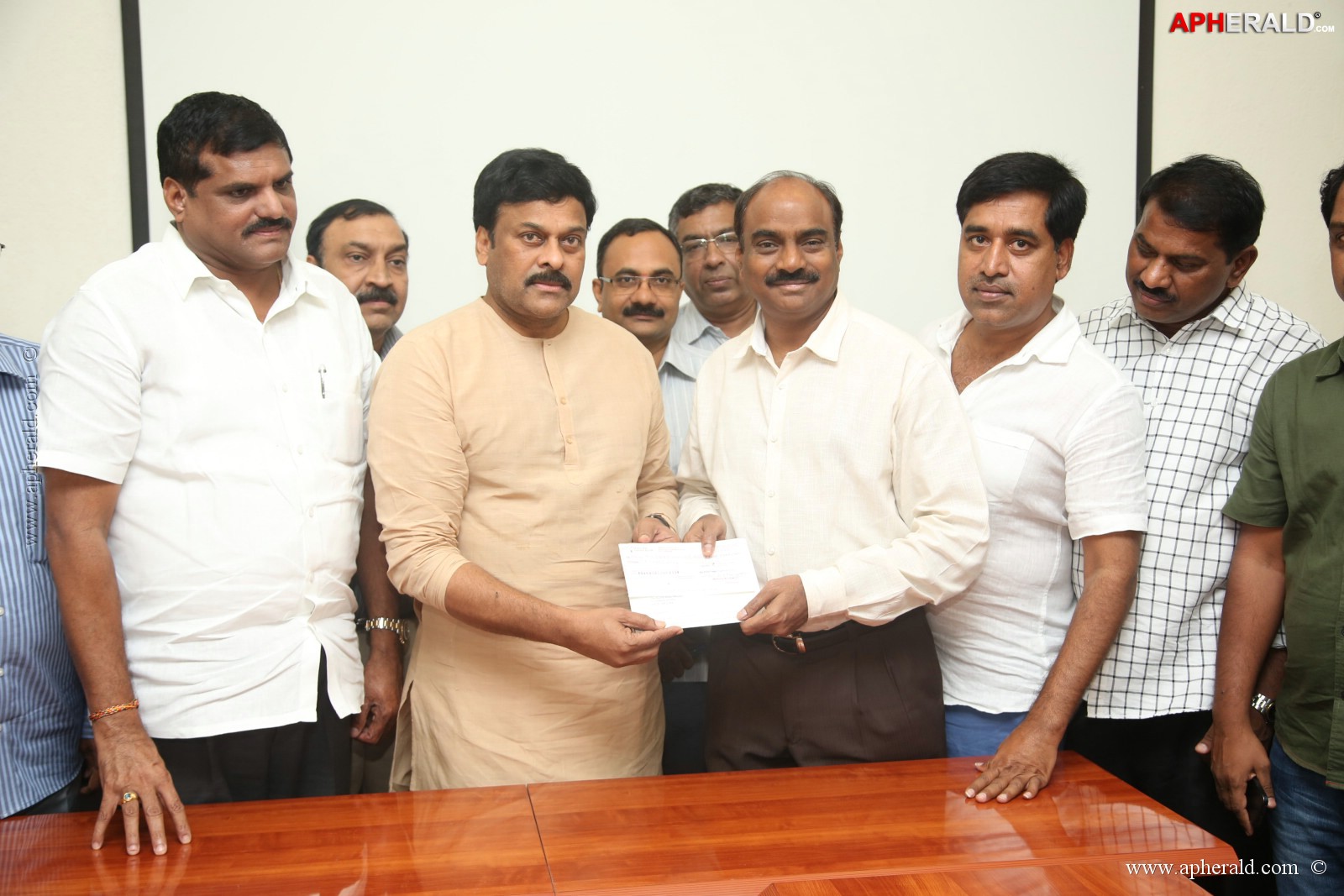 KL Narayana gives 10 Lakh Cheque To Chiranjeevi