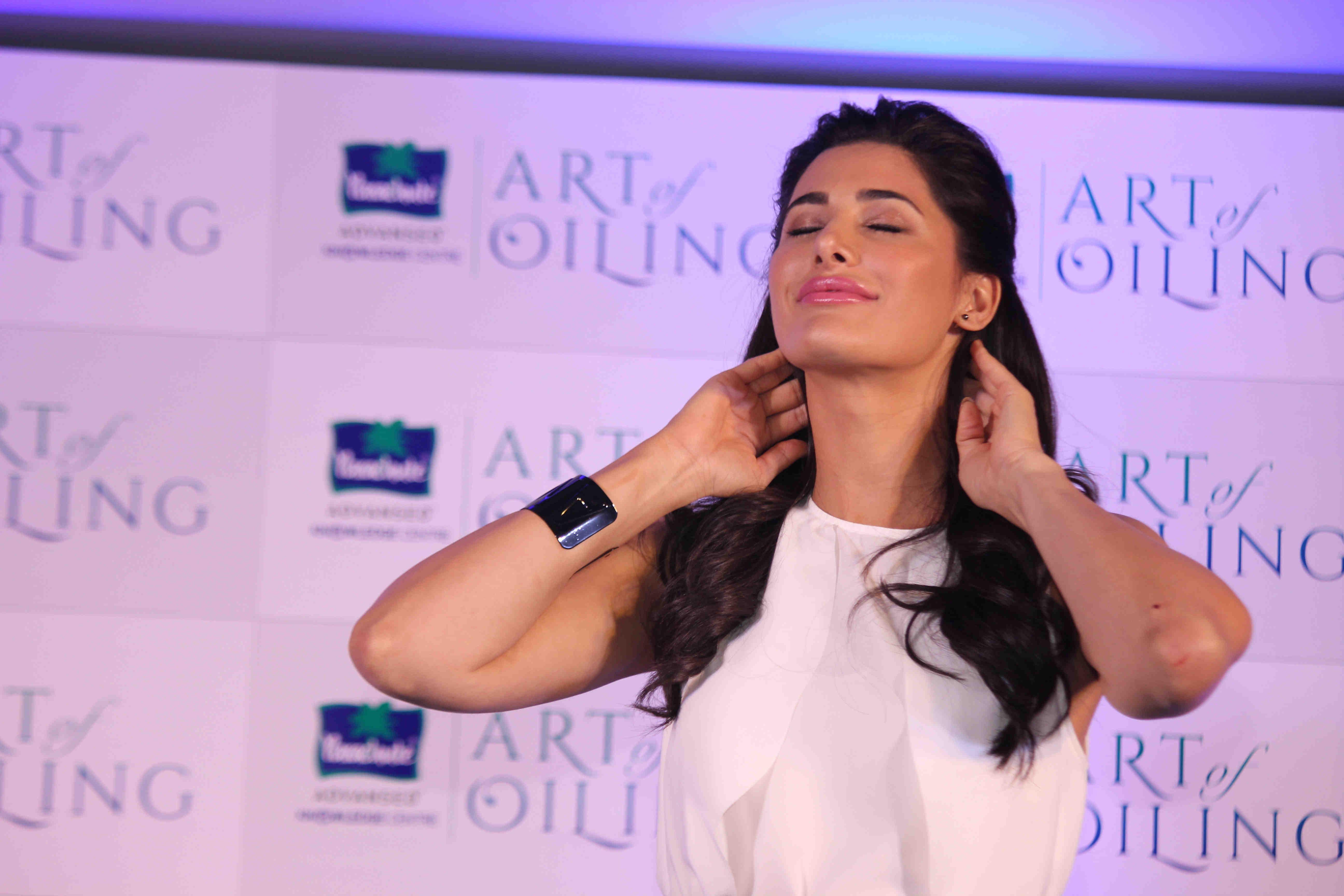 Nargis Fakhri Launch Parachute Signature Line Art Of Oiling