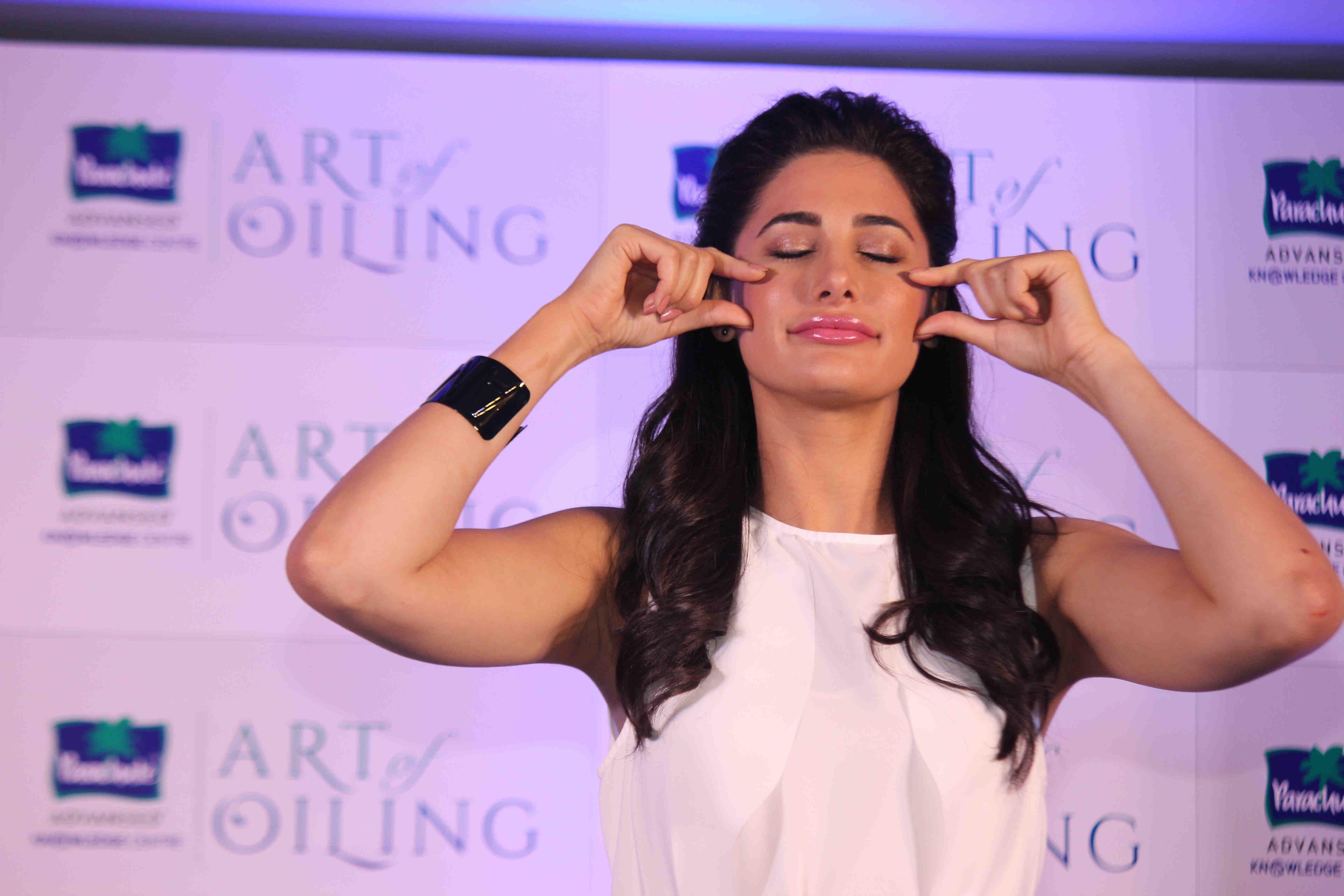 Nargis Fakhri Launch Parachute Signature Line Art Of Oiling