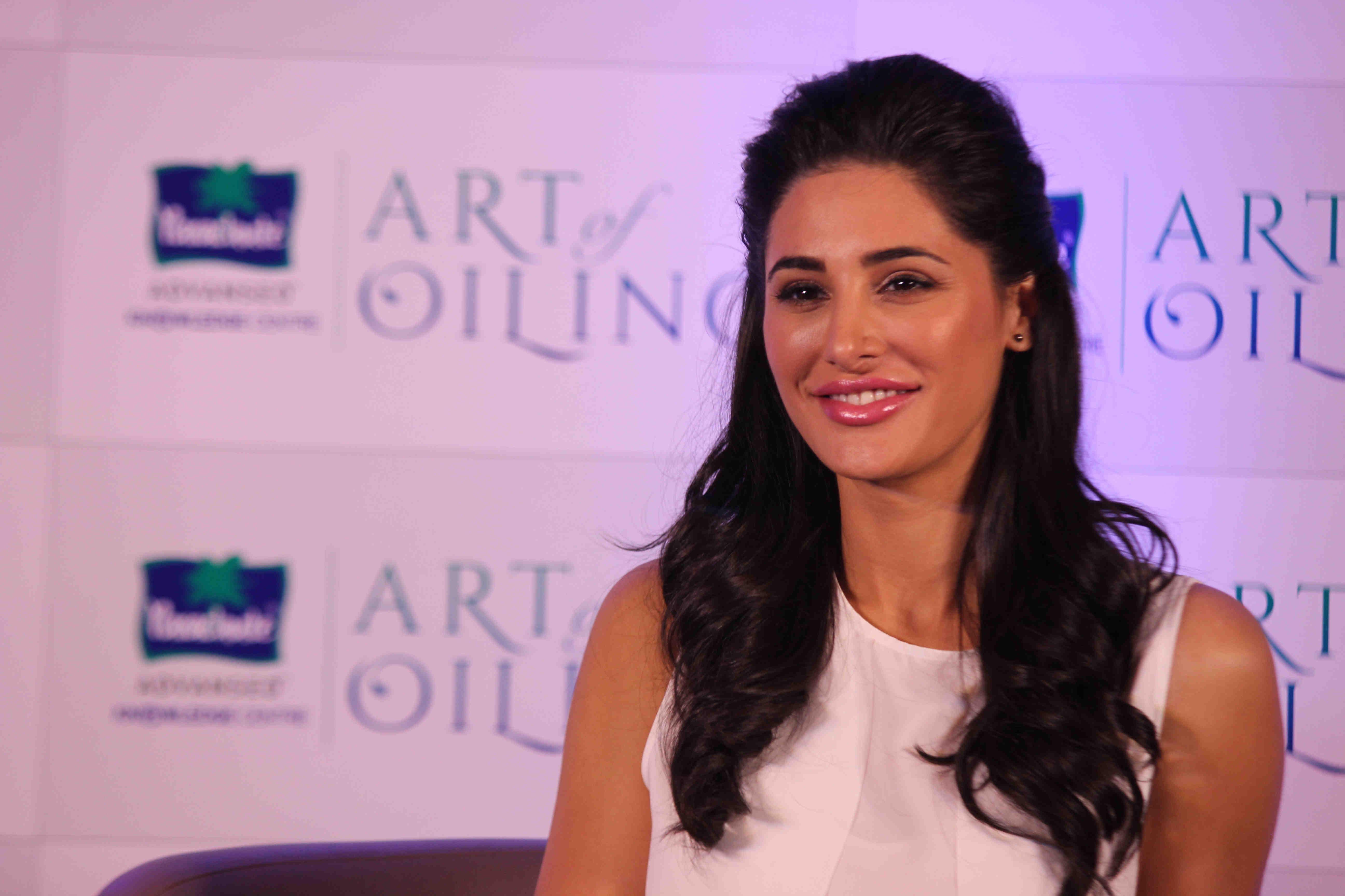 Nargis Fakhri Launch Parachute Signature Line Art Of Oiling