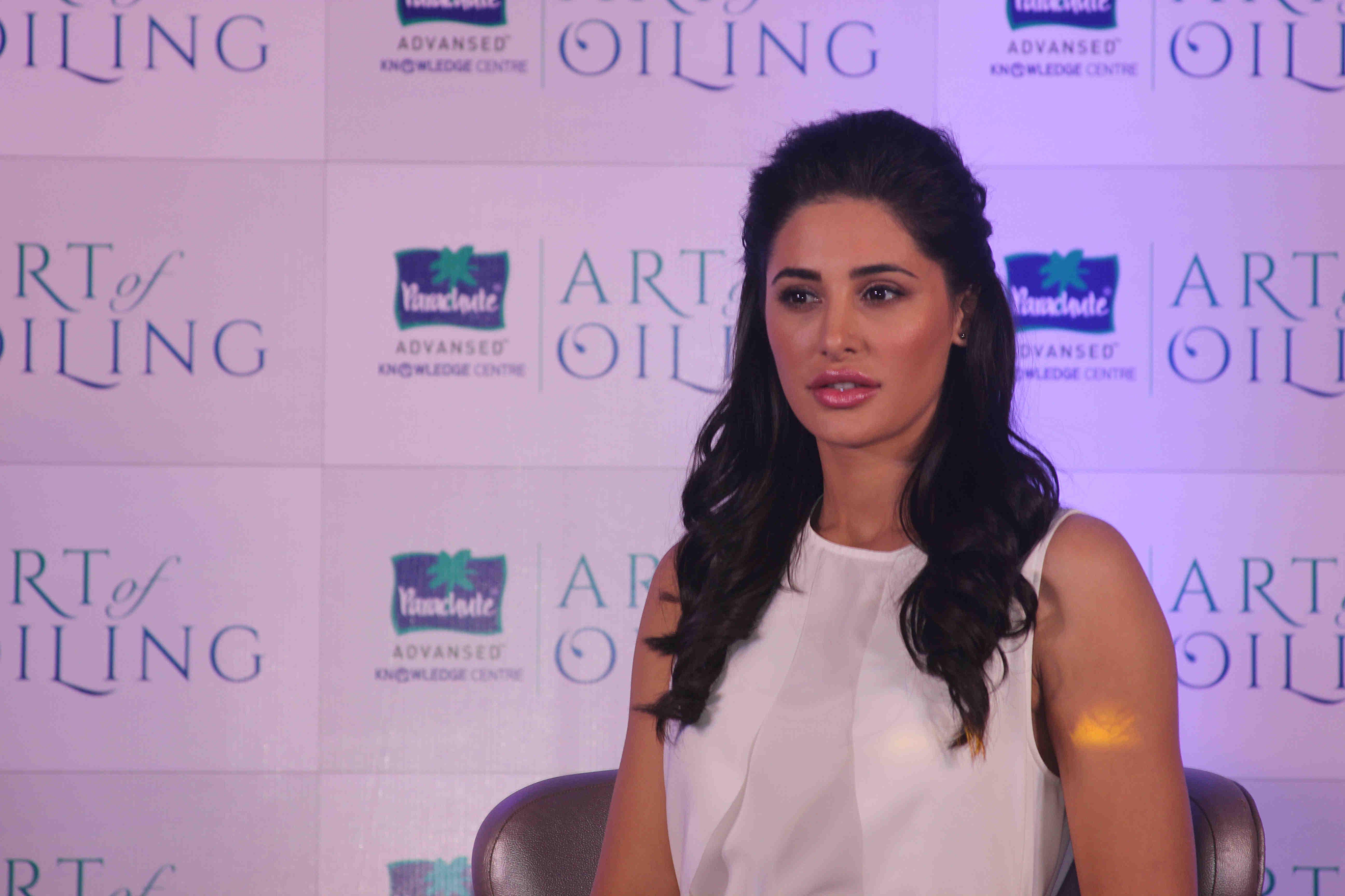 Nargis Fakhri Launch Parachute Signature Line Art Of Oiling