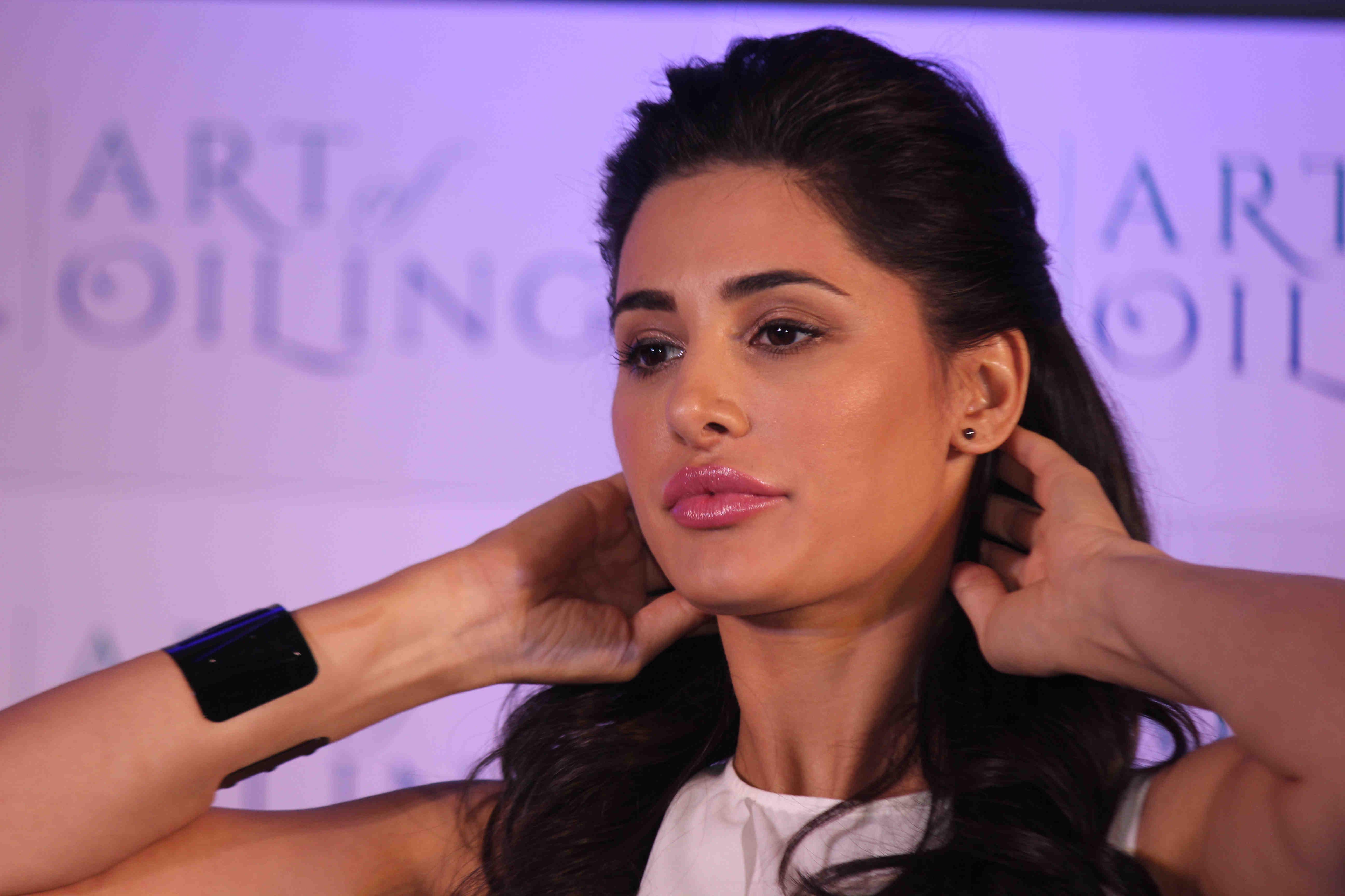 Nargis Fakhri Launch Parachute Signature Line Art Of Oiling