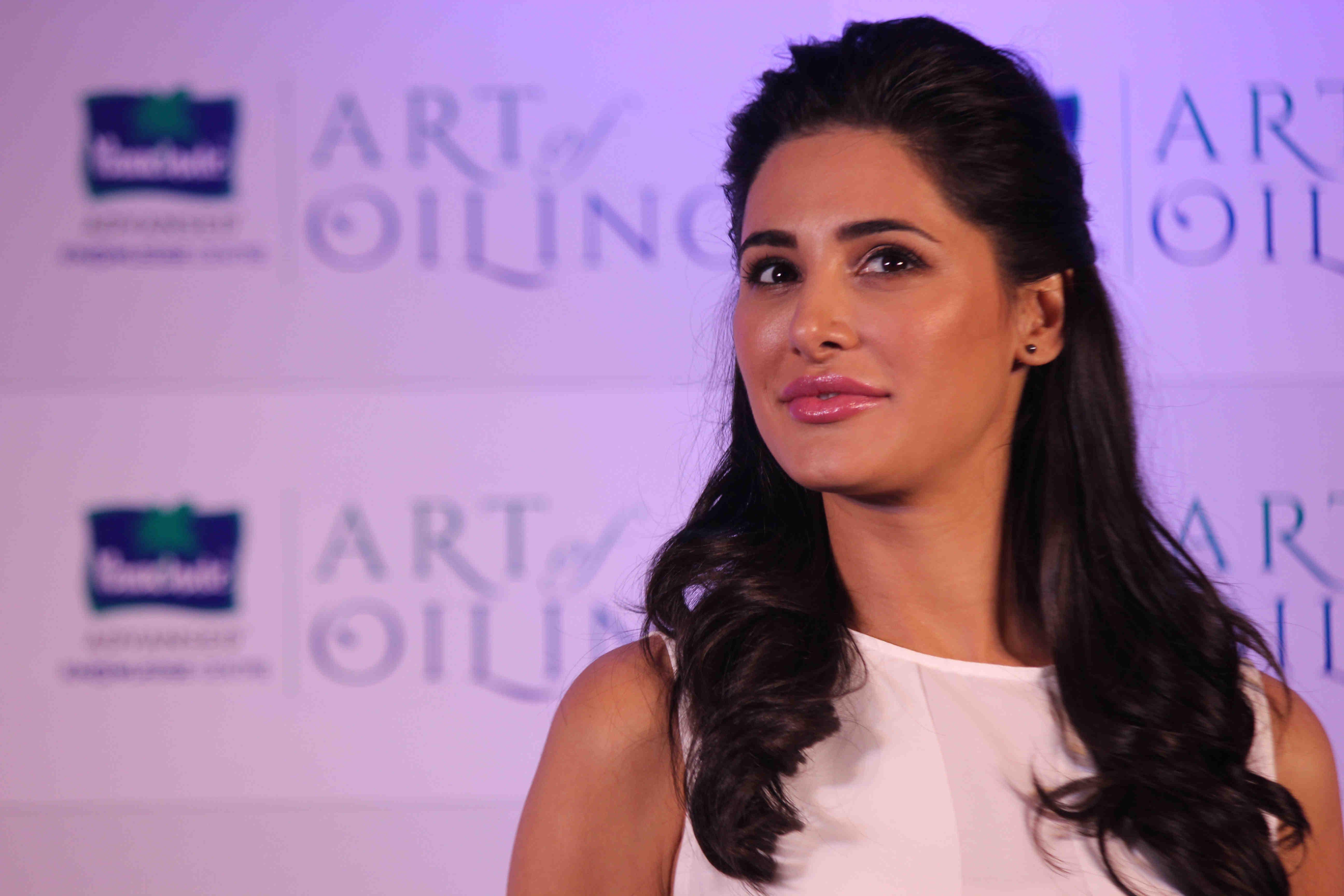 Nargis Fakhri Launch Parachute Signature Line Art Of Oiling