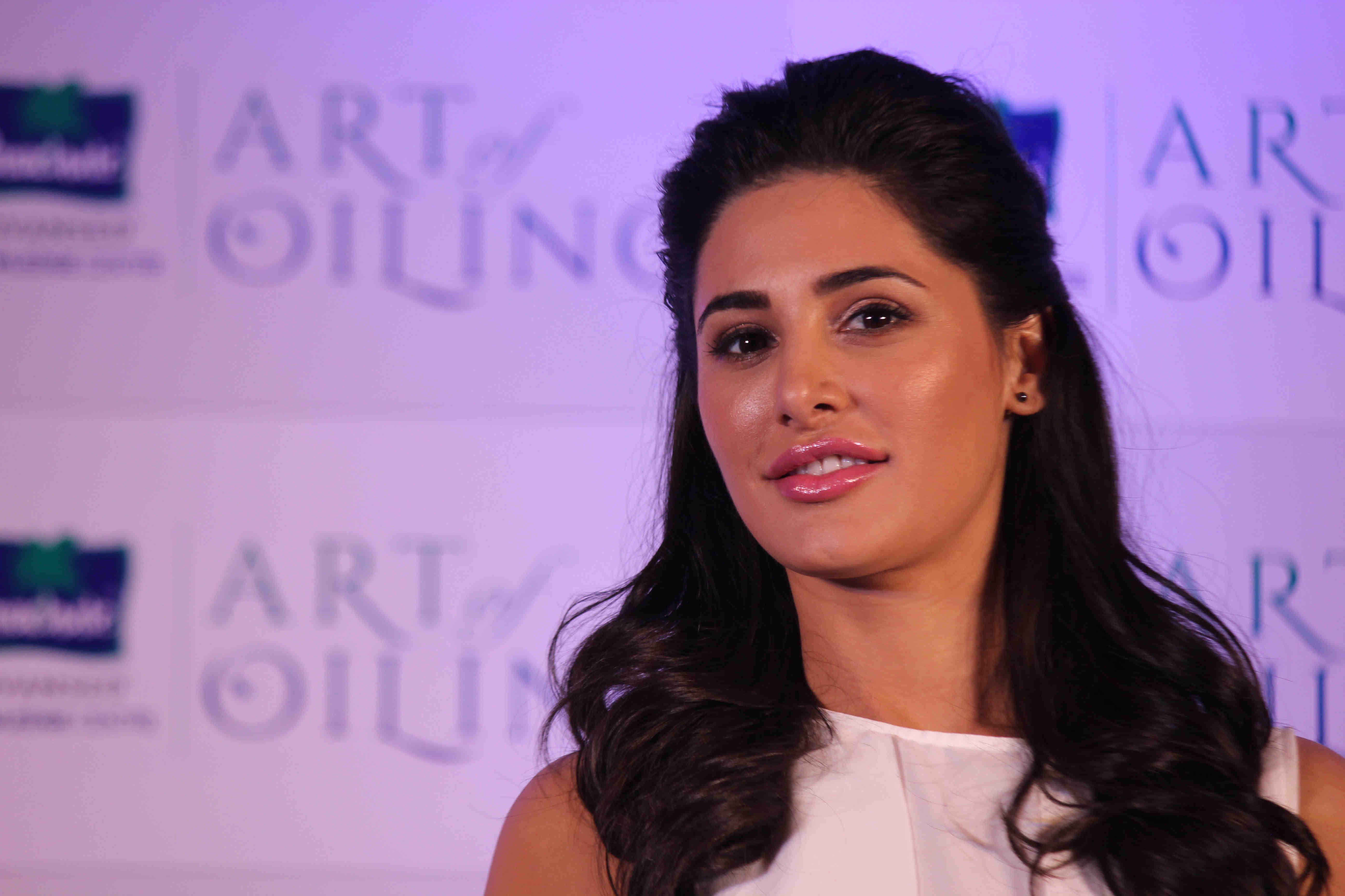 Nargis Fakhri Launch Parachute Signature Line Art Of Oiling