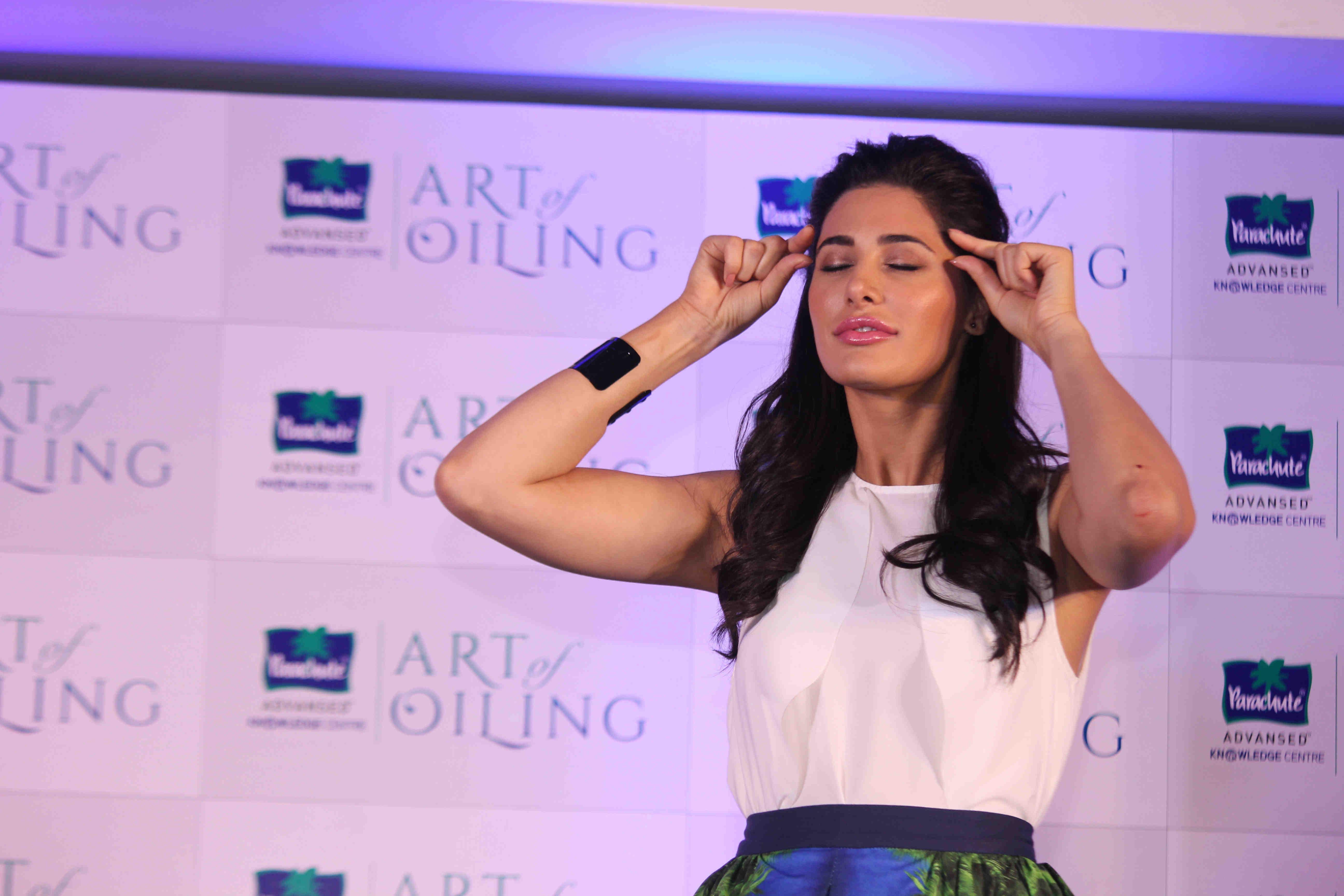 Nargis Fakhri Launch Parachute Signature Line Art Of Oiling