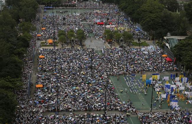 Thousands March for Democracy in Hong Kong Photos