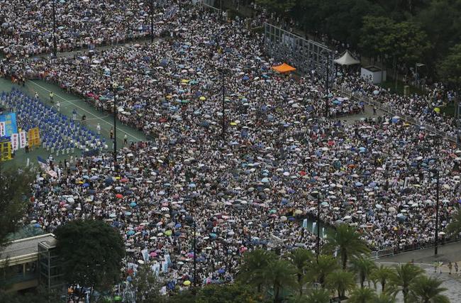 Thousands March for Democracy in Hong Kong Photos