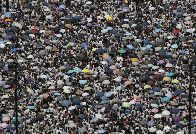 Thousands March for Democracy in Hong Kong Photos