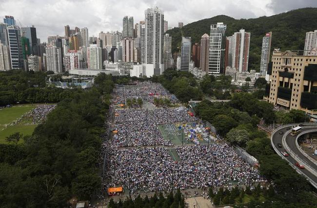 Thousands March for Democracy in Hong Kong Photos