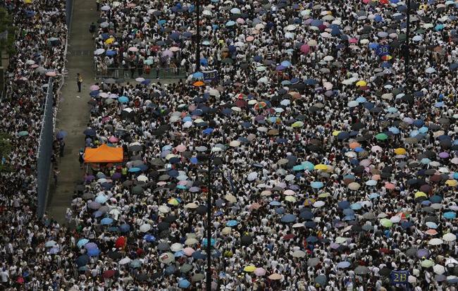 Thousands March for Democracy in Hong Kong Photos