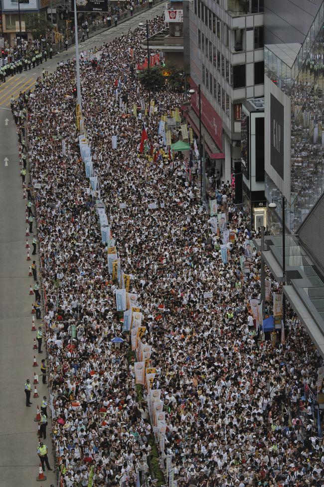 Thousands March for Democracy in Hong Kong Photos