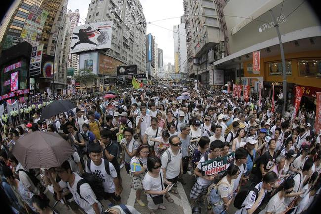 Thousands March for Democracy in Hong Kong Photos