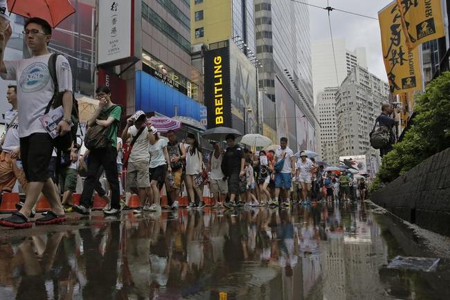 Thousands March for Democracy in Hong Kong Photos