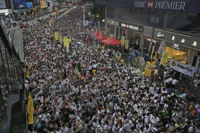 Thousands March for Democracy in Hong Kong Photos