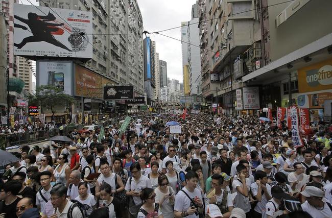 Thousands March for Democracy in Hong Kong Photos