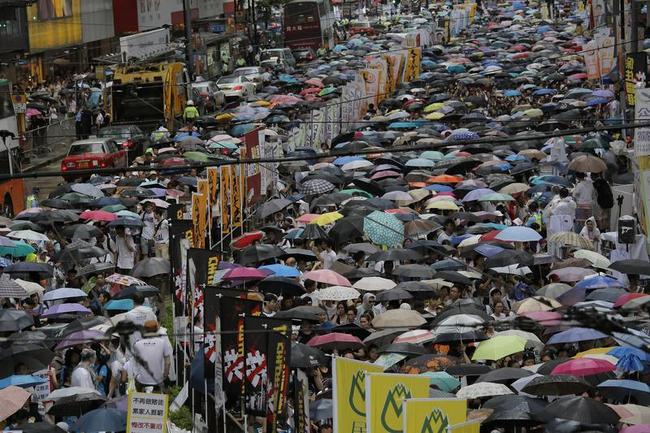 Thousands March for Democracy in Hong Kong Photos