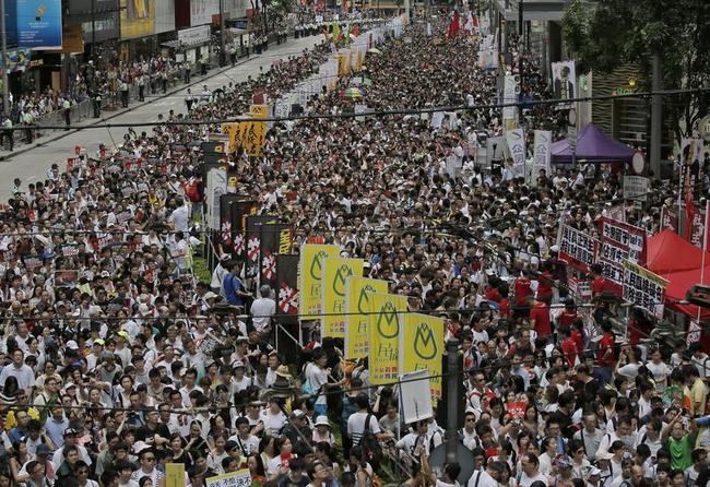 Thousands March for Democracy in Hong Kong Photos