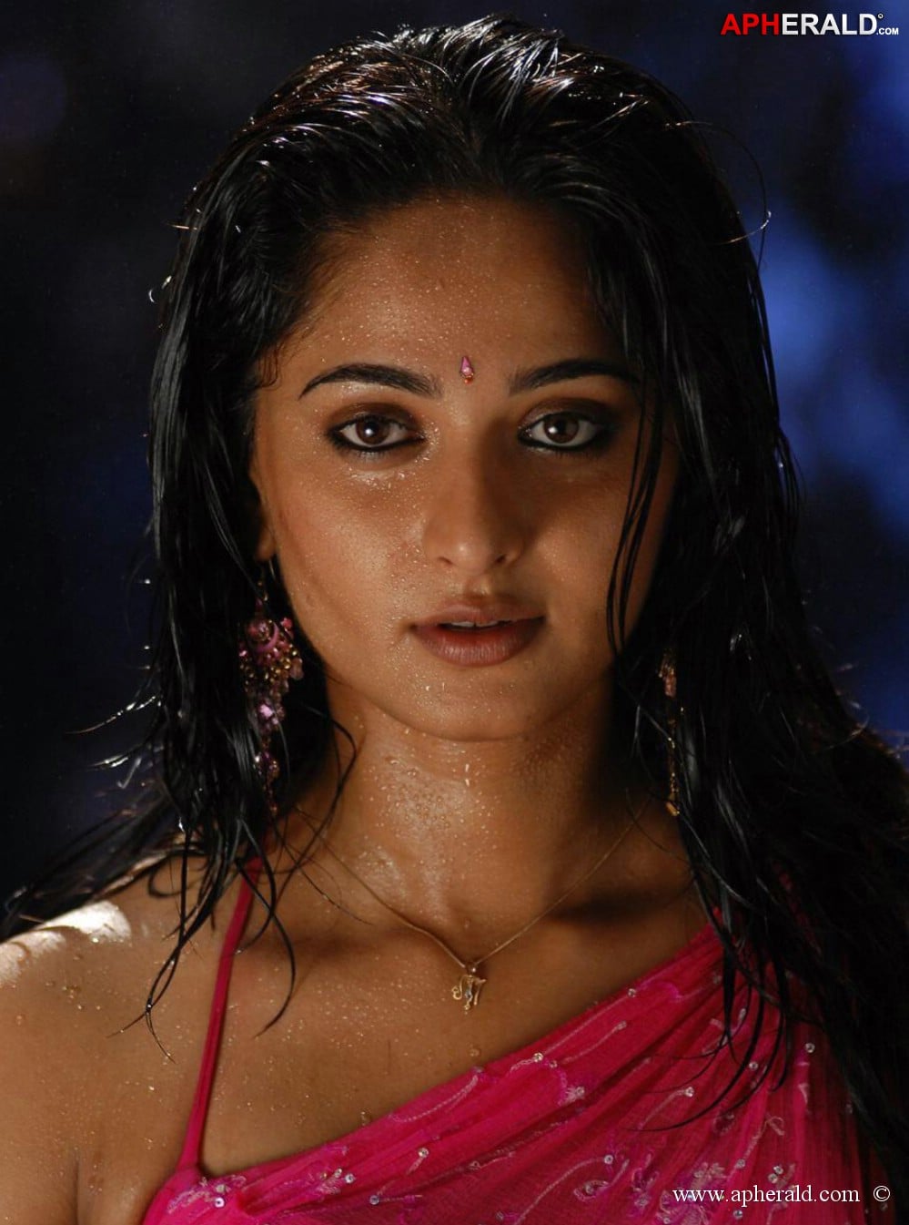 Anushka wet in rain photos