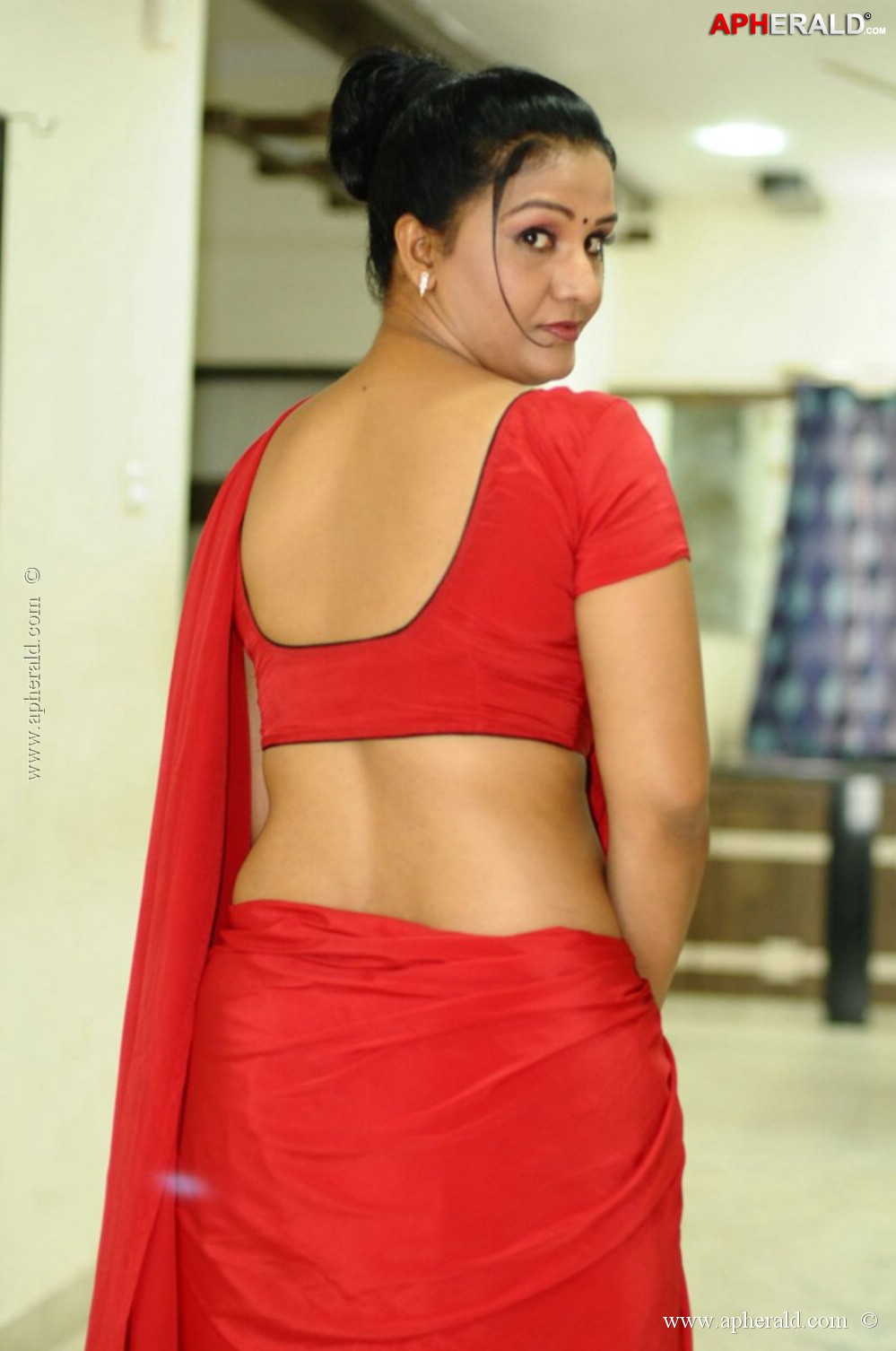 Apoorva in Red Saree Hot Photos