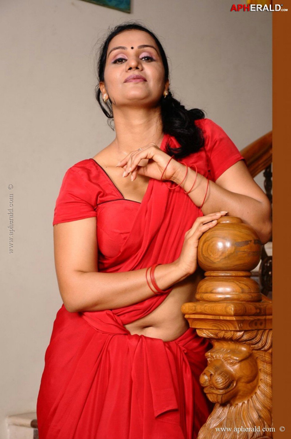 Apoorva in Red Saree Hot Photos