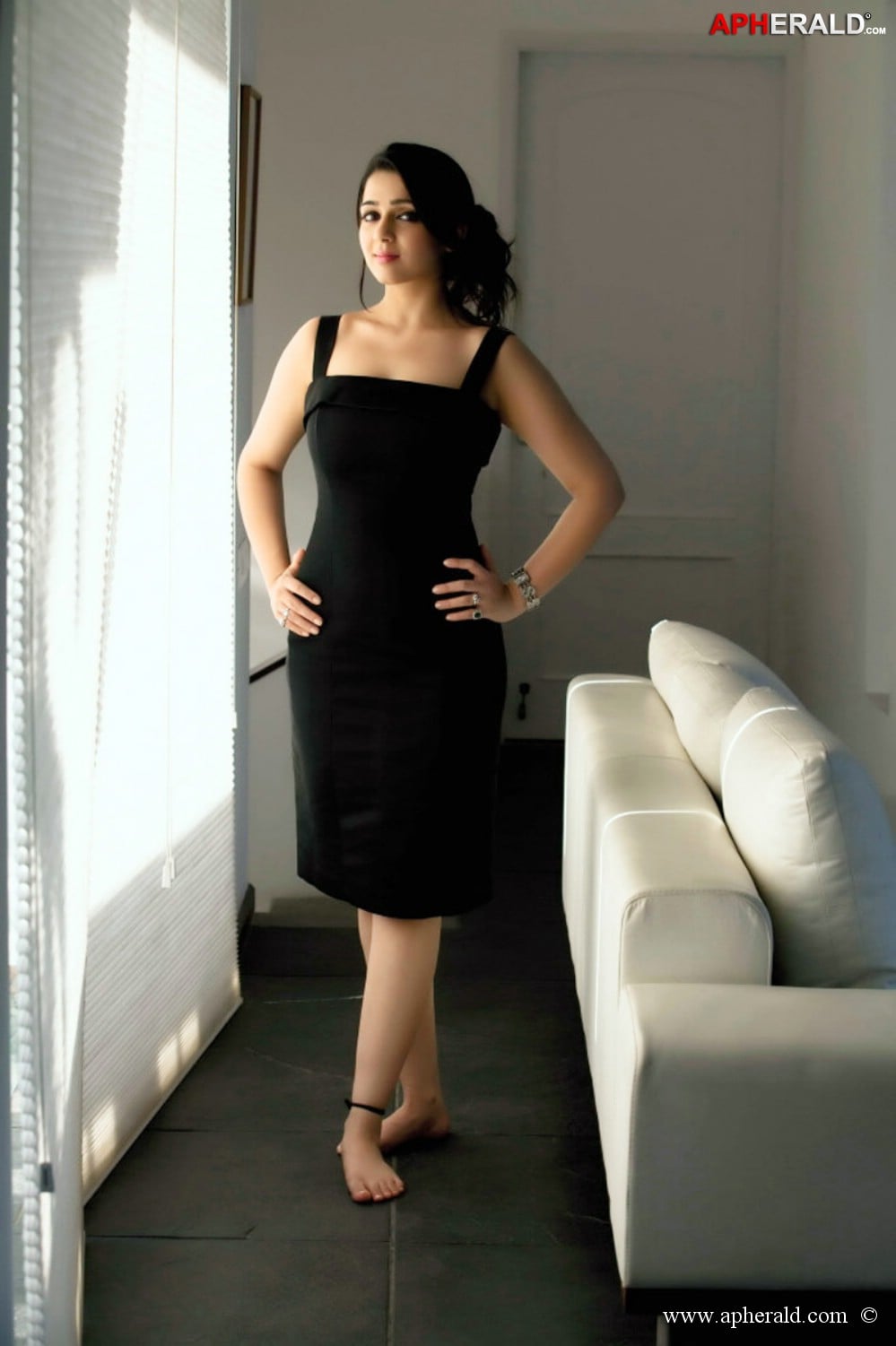 Charmy Kaur in Black Dress Stills