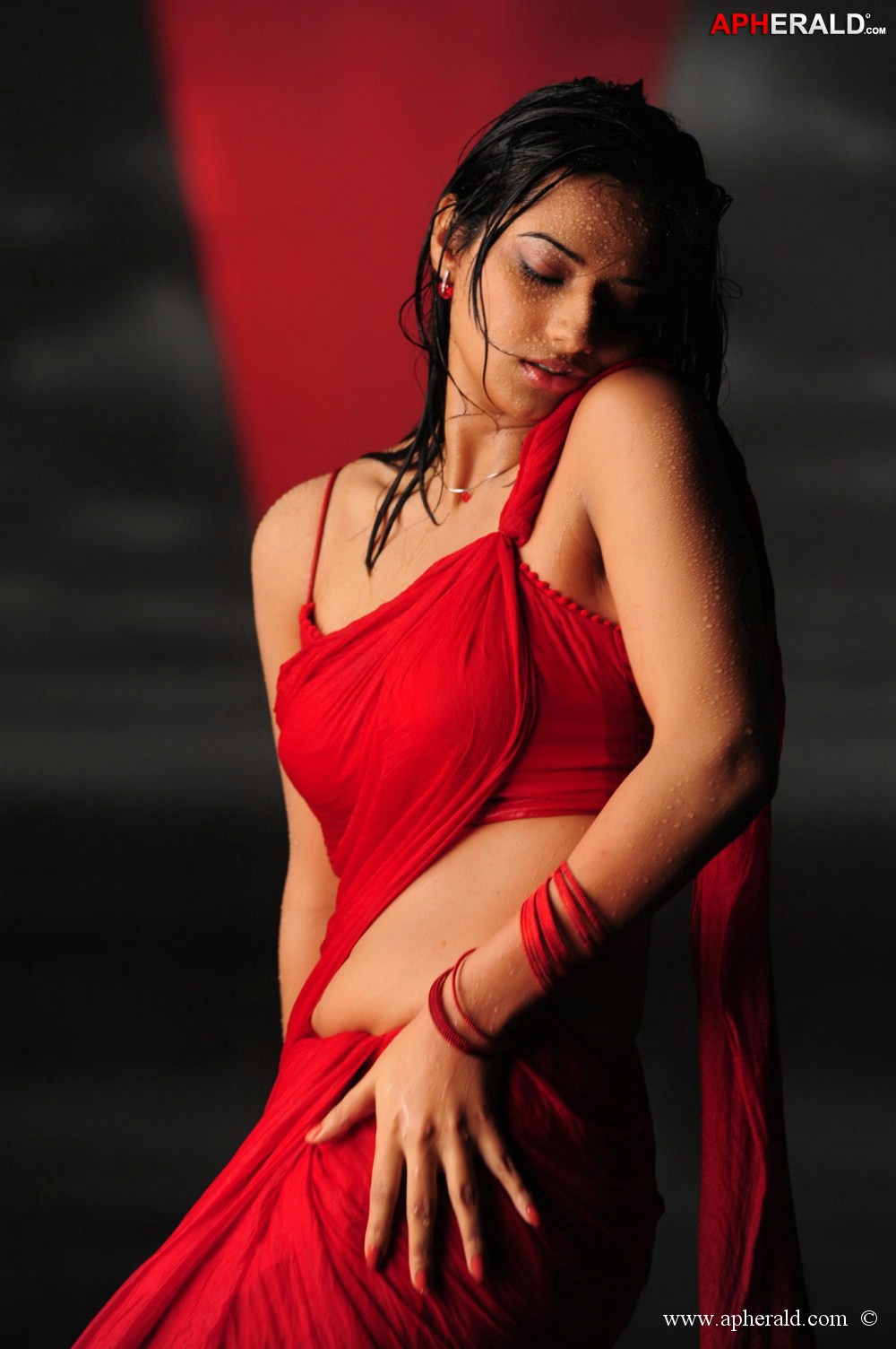 Isha Chawla Red Saree Hot Photos