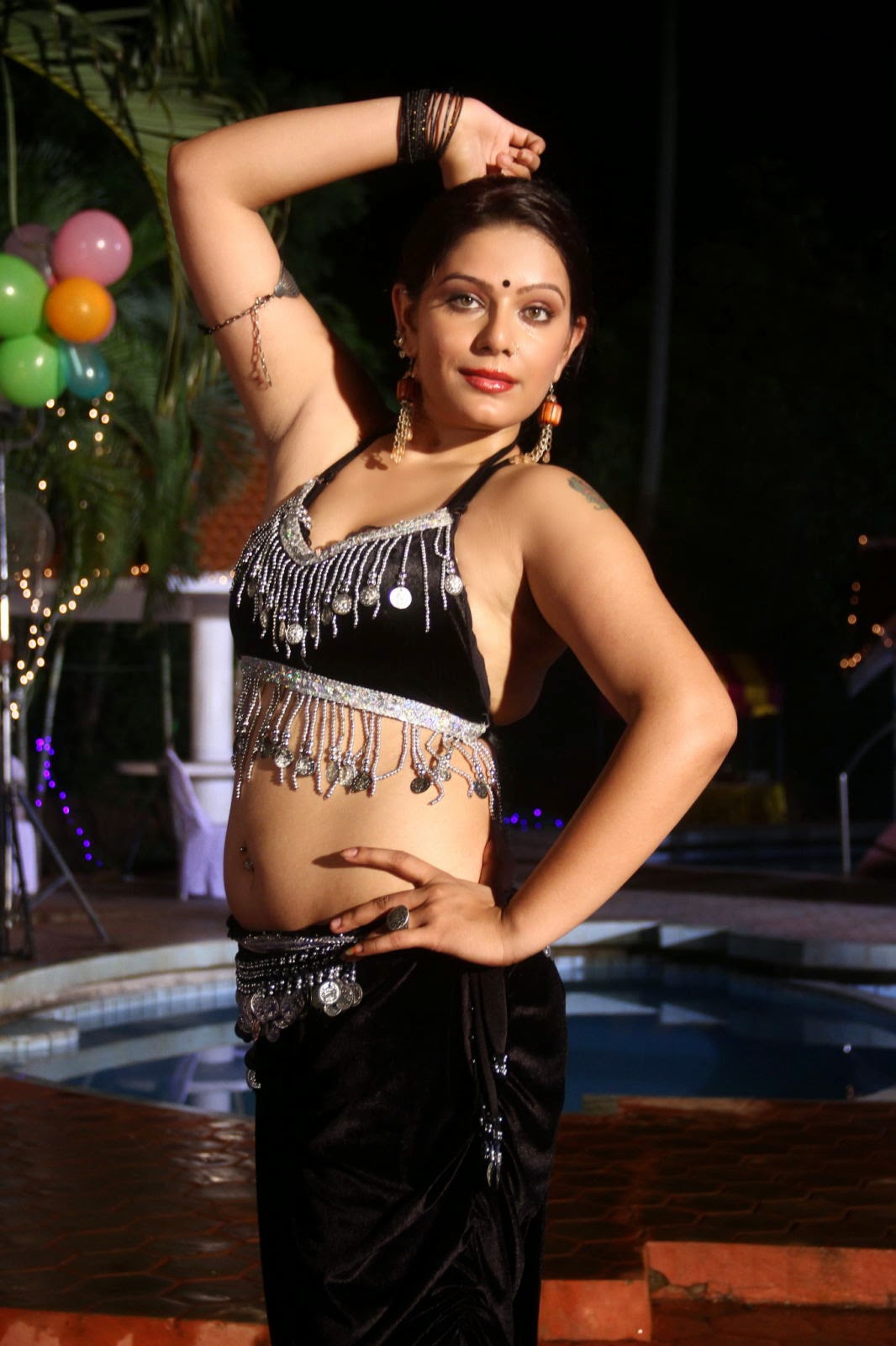 Reva Hot photos from New Item Song