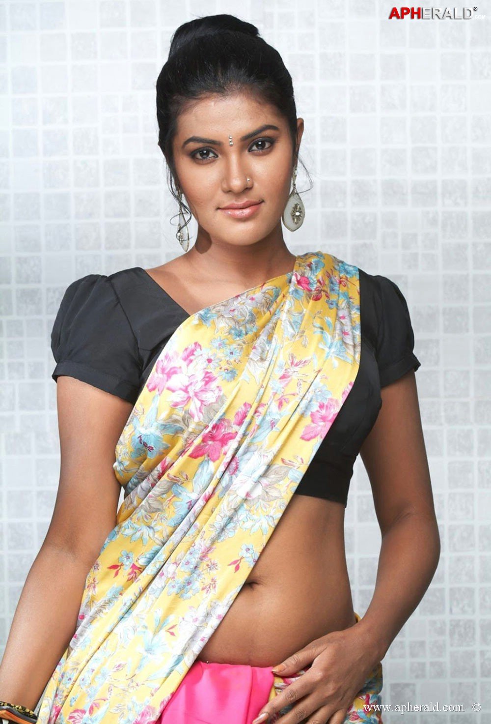 Rythamika Hot in Saree Photos