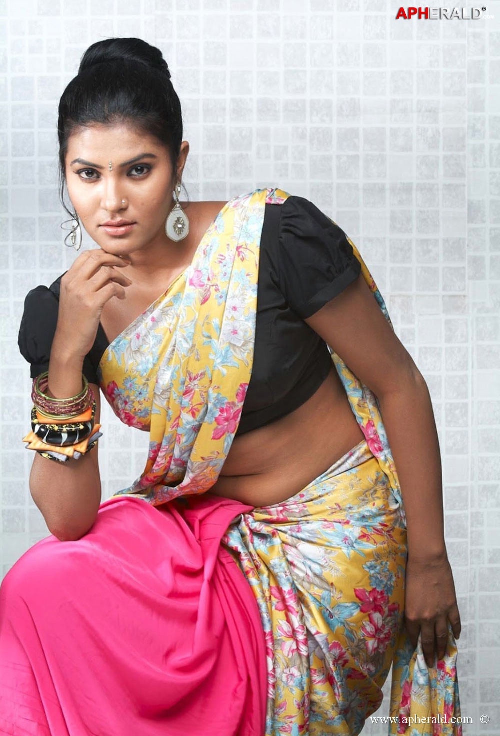 Rythamika Hot in Saree Photos