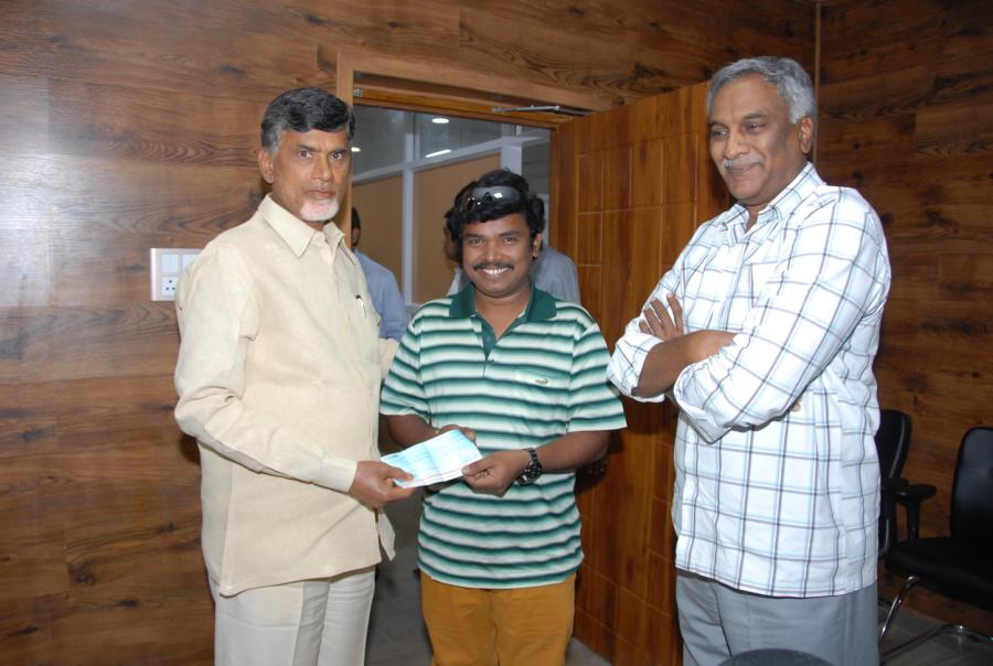 Cheque Presentation By Sampoornesh Babu To AP CM