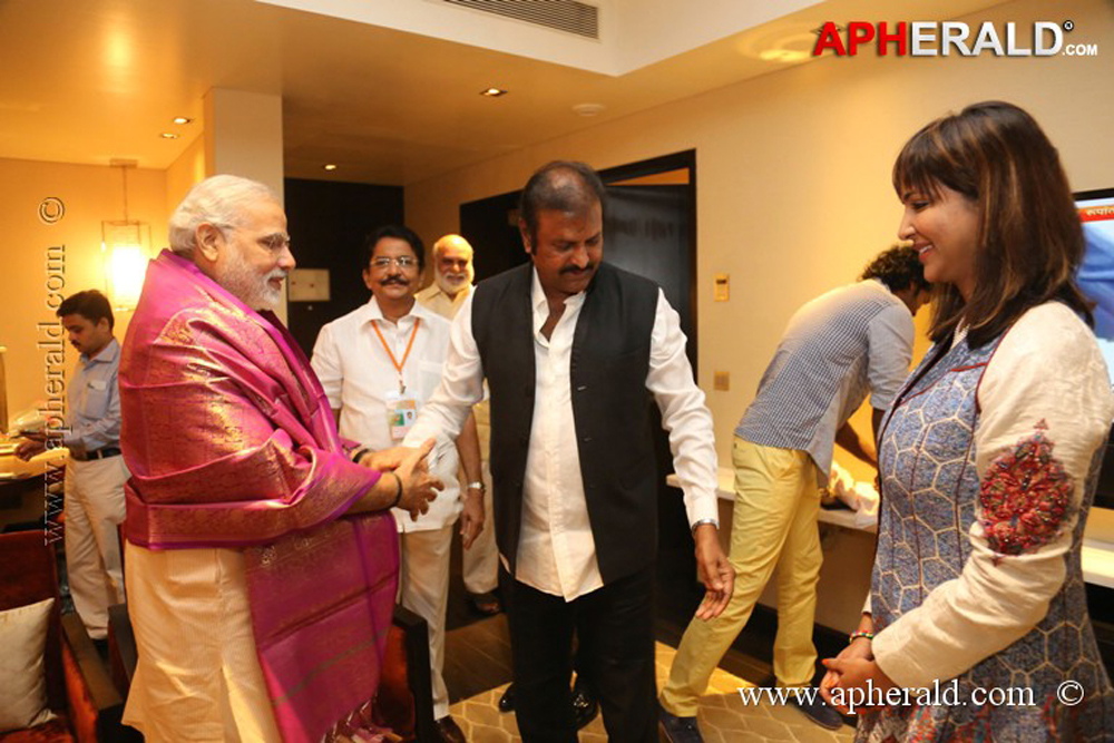 Mohan Babu Family with Modi Photos