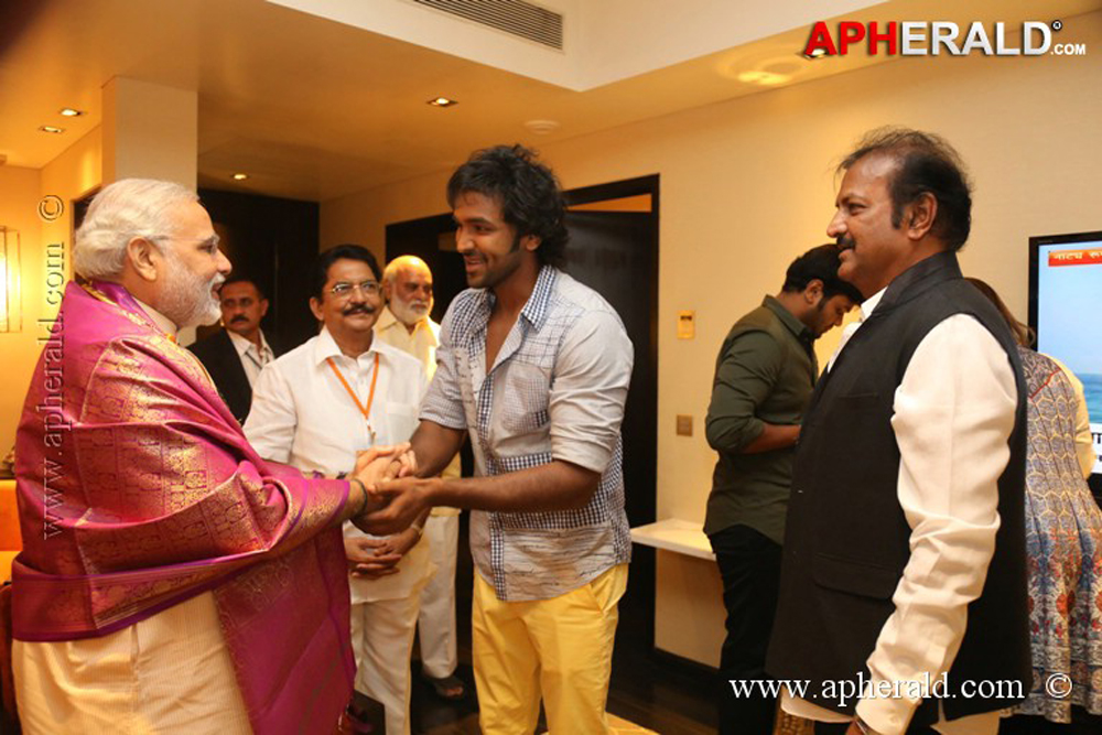 Mohan Babu Family with Modi Photos