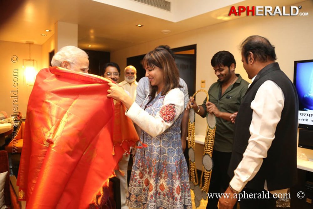 Mohan Babu Family with Modi Photos