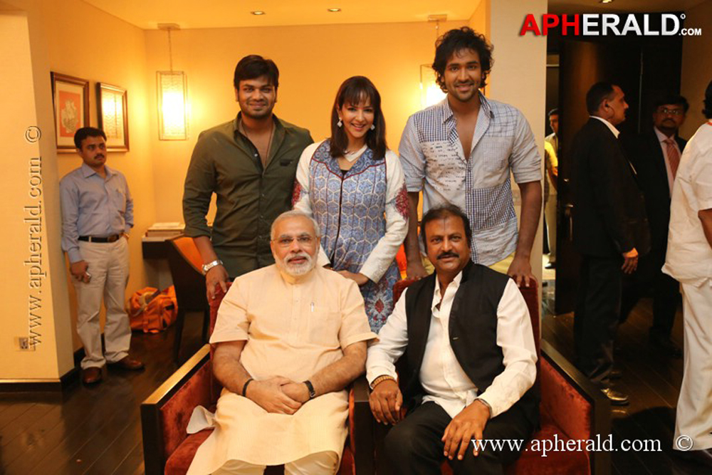 Mohan Babu Family with Modi Photos