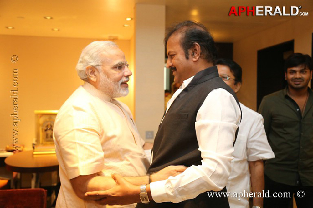 Mohan Babu Family with Modi Photos