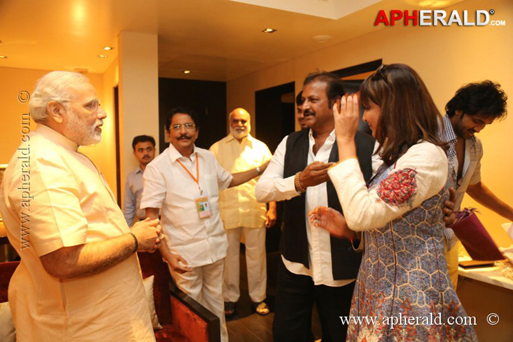 Mohan Babu Family with Modi Photos