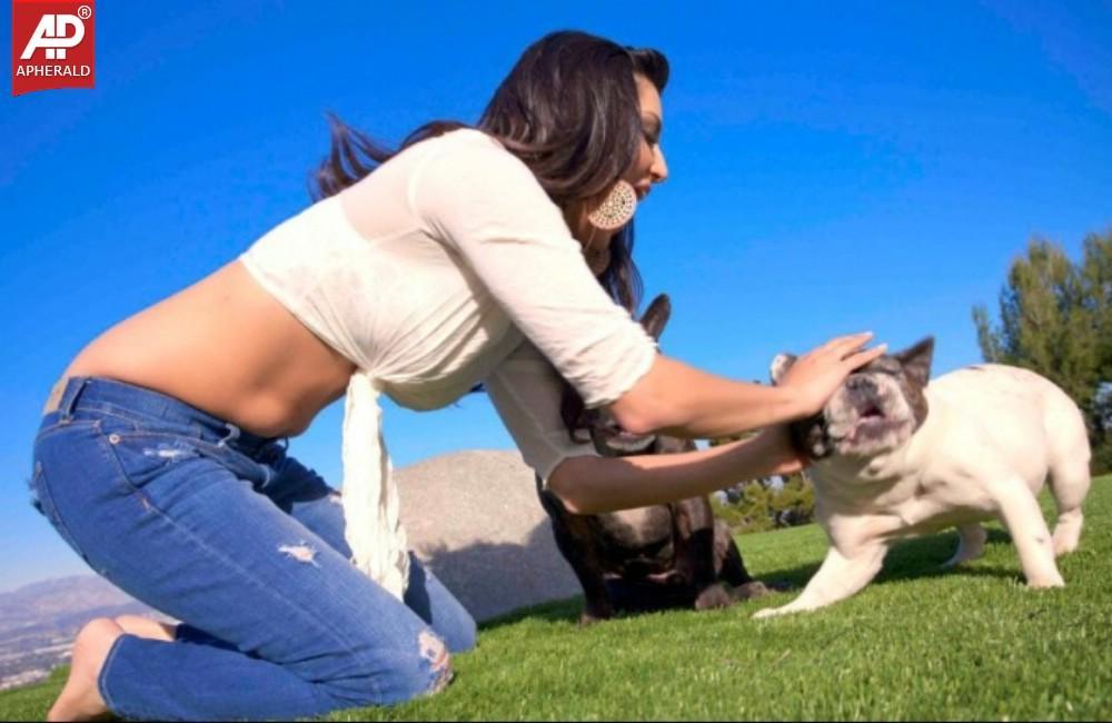 Sunny Leone poses with dog