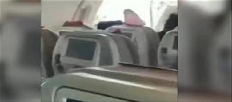 Mid-Air Scare: 22-Year-Old Tried To Open Emergency Exit...