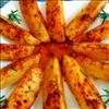 Oven roasted potatoes with hot chili sauce 