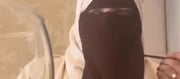 Muslim Woman Teaches How To Eat With Hijab On - VIDEO