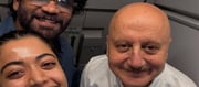 Anupam shared a picture with Nagarjuna-Rashmika from the flight!!