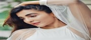 Parvati Nair Latest Photos In White Dress
