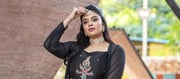 Sreemukhi Amazing Photos In Black Dress