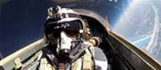 How similar is space travel to flying a fighter plane?