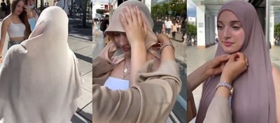 VIDEO - Muslim Woman Makes European Girl To Wear Hijab
